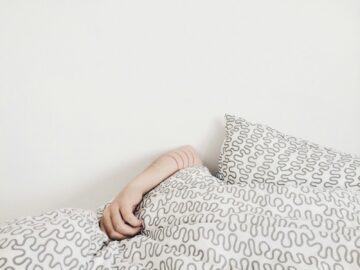 person lying on bed